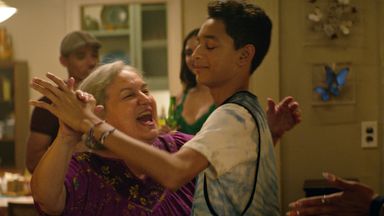 Abuela Claudia (Olga Merediz) and Sonny (Gregory Diaz III) share differing stories of immigration in the film. Pic: Warner Bros Studios